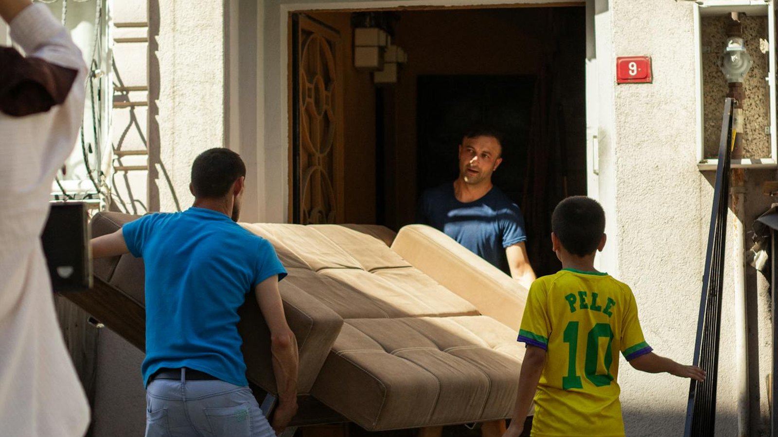 Senior Moving Company box truck parked outside a North Dallas home on moving day
